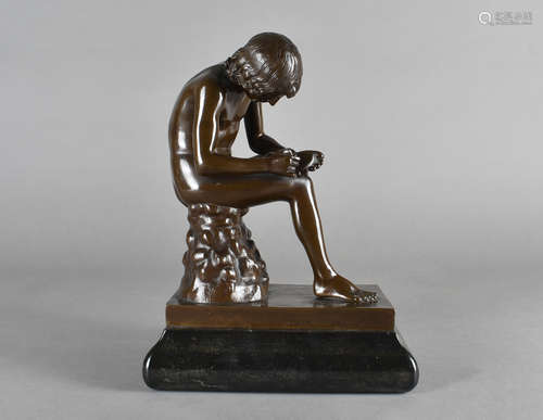 A Barbedienne bronze study, after Spinarco, a seated youth picking a thorn from his foot, on a