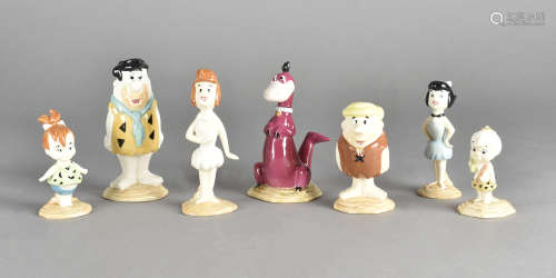 A collection of Beswick Flintstone character figurines, comprising Wilma, Fred, Betty, Barney, Bam