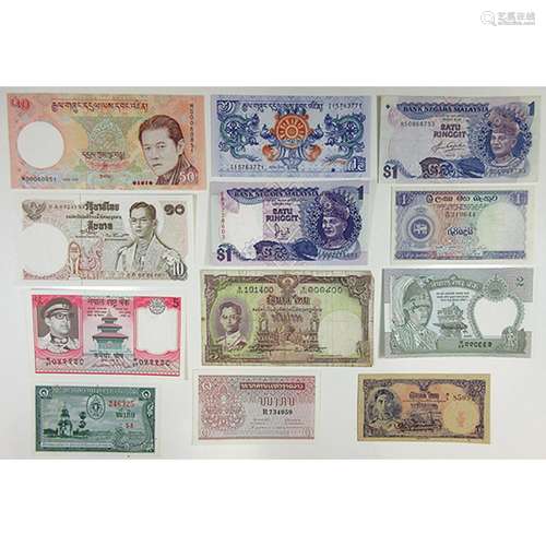 Assorted Asian Issuers. 1940s-2000s. Group of 12 Issued Notes.