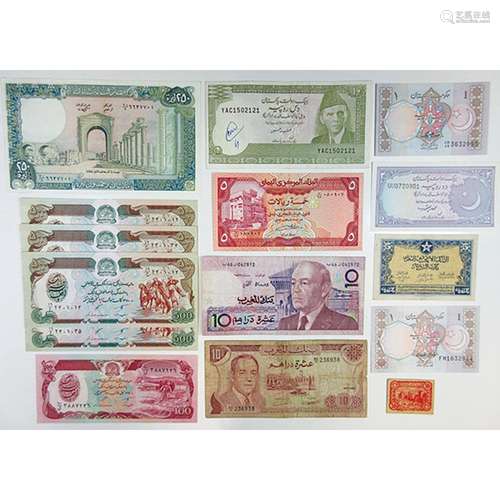 Assorted Middle Eastern Issuers. 1940s-1990s. Group of 24 Issued Notes.