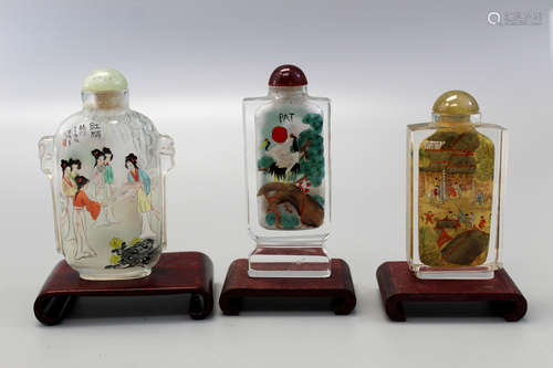 Three (3) Chinese reverse painting on glass snuff bottles.