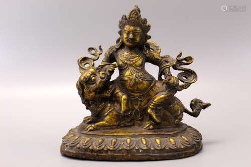 A tibetan bronze statue.