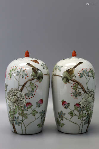 A pair of Chinese famille rose covered jars.