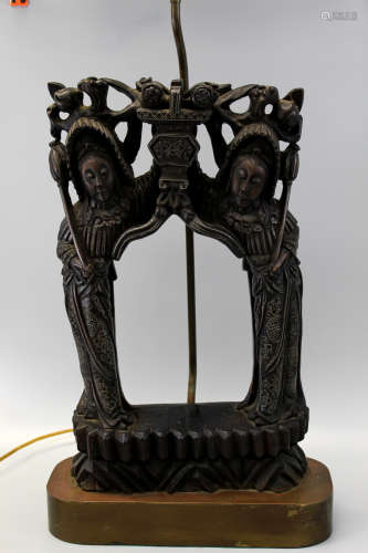 Chinese carved wood statue with silver inlaid.
