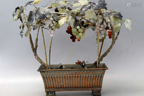 A jade grape tree planter.