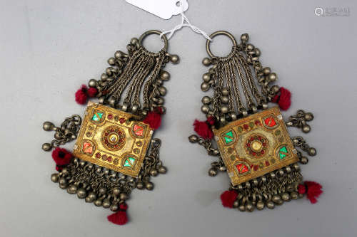 A pair of antique Chinese minority ethnic group silver ear rings