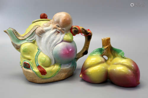 Chinese shoulao porcelain teapot and peach shape water dropper.