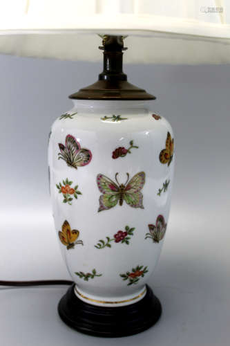 Butterfly porcelain vase lamp.