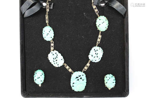 A beautiful set of Chinese silver and carved turquoise jewelry.