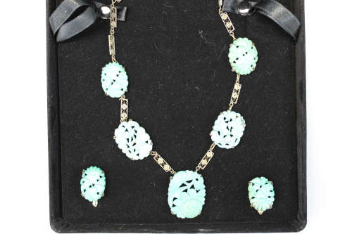 A beautiful set of Chinese silver and carved turquoise jewelry.