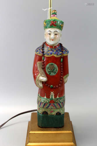 Chinese porcelain court figure mounted on a lamp.