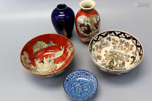 A group of Japanese porcelain items.