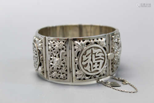 A Chinese silver bracelet.
