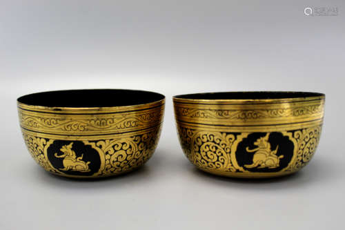 A pair of Thai gilt lacquer bowls.