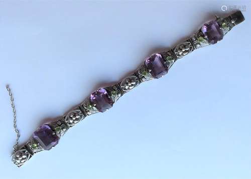 SUFFRAGETTE: A silver-mounted stylish bracelet wit