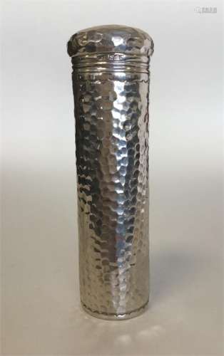 A cylindrical silver toilet jar with lift-off cove