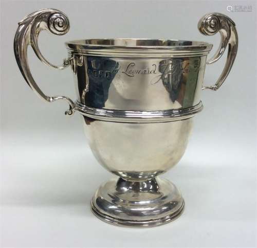 DUBLIN: A Georgian Irish silver trophy cup with sc