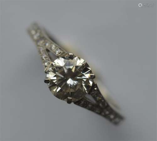 A pleasing diamond single stone ring in four claw