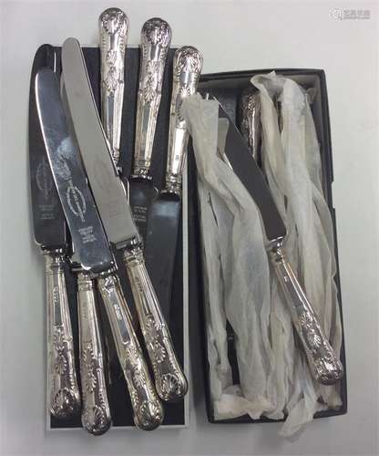 A set of six Kings' pattern silver table knives to