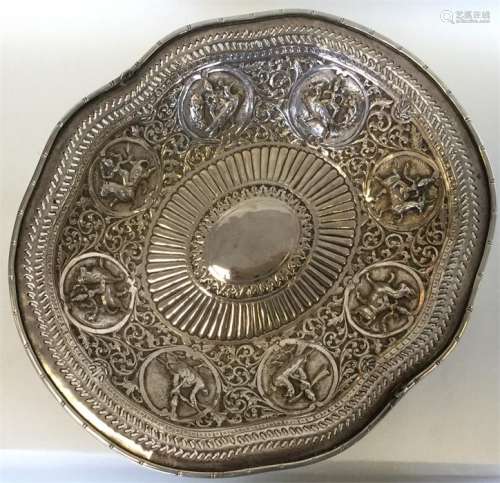 A heavy Indian silver basket with pierced decorati