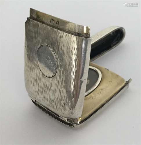 An unusual rare hinged front silver vesta depictin