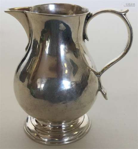 An early Georgian pitcher cream jug. London 1729.