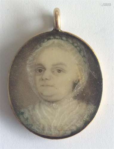 An 18th Century gold framed miniature of a lady. A