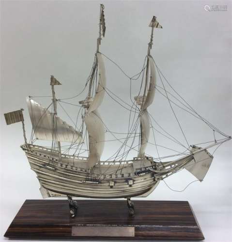 An unusual Dutch silver model of a Galleon on rose