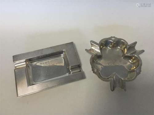 Two silver engine turned ashtrays with fluted deco