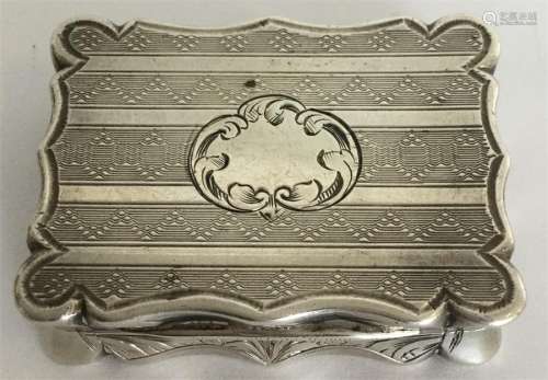 A good quality large silver vinaigrette with scrol