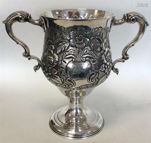 A George III heavy Irish silver embossed two-handl