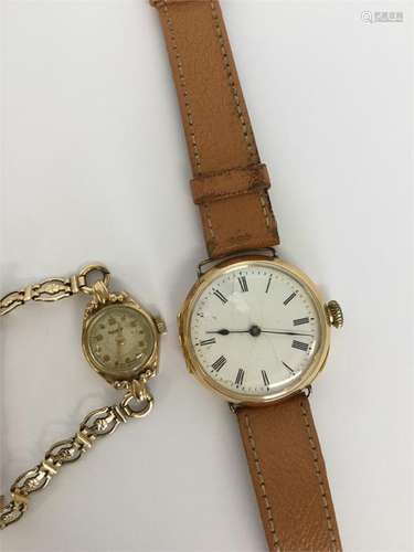 A gent's 18 carat wristwatch on leather strap toge