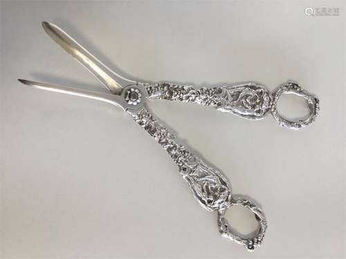 A good pair of silver grape scissors with cast han