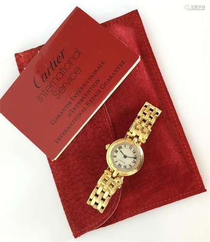 CARTIER: A lady's 18 carat gold wristwatch with si