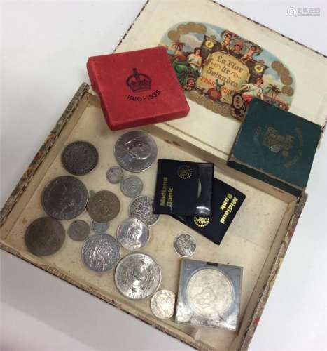 A box containing silver Continental and other Crow