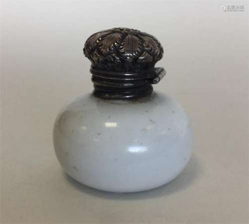 An attractive miniature silver mounted scent bottl