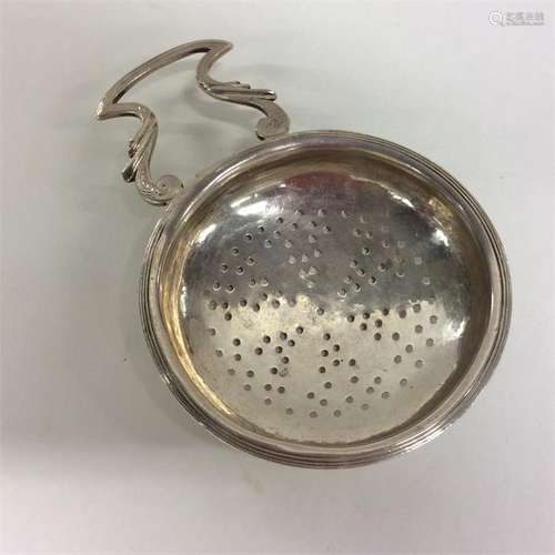 A Georgian Scottish silver lemon strainer of typic