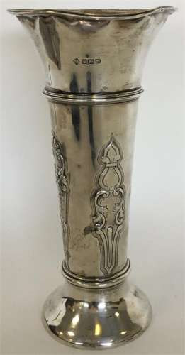 A large silver tapering spill vase with floral dec