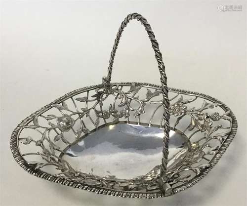 A Georgian silver turned swing-handled basket attr