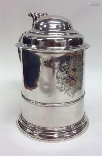 A good Georgian silver lidded tankard with engrave