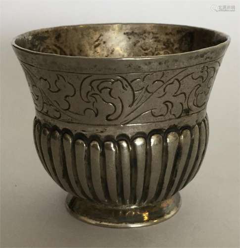 A small Russian silver tot with half fluted decora