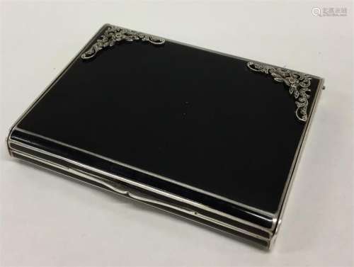 A good quality silver gilt and enamelled compact w
