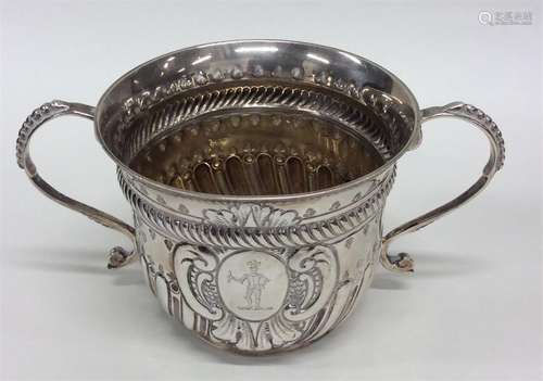 A heavy silver Georgian-style porringer of half fl