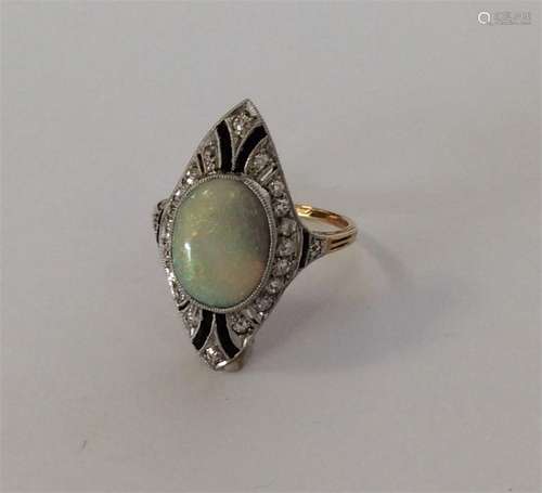 A good quality opal, diamond and onyx cluster ring