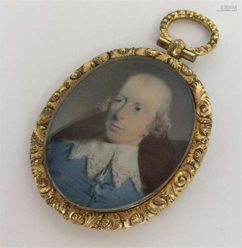 An 18th Century oval gold miniature of a gentleman