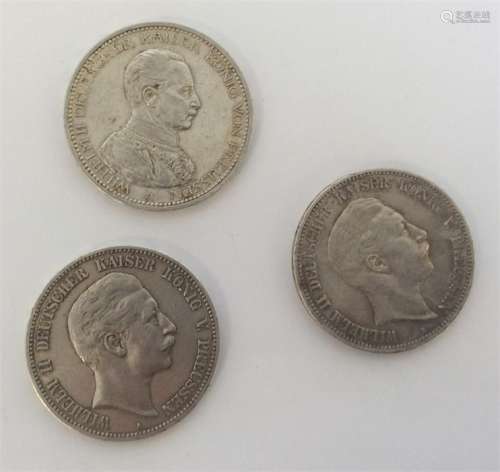 Three German silver Marks. Est. £25 - £35.
