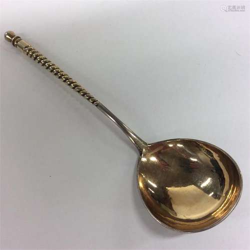 A good quality Russian silver gilt spoon with twis