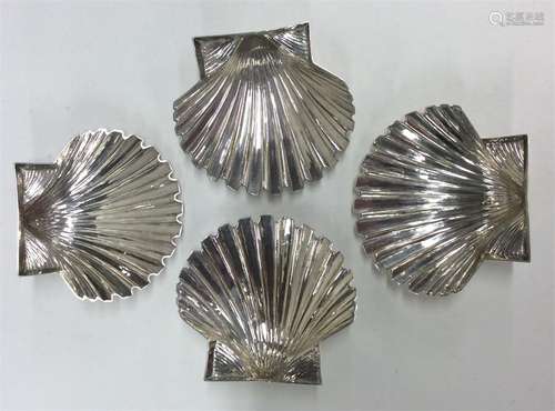 A good set of four Italian silver scallop-shaped s