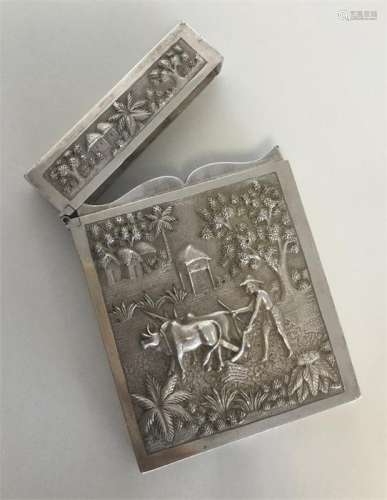 A massive Indian silver cigarette case with hinged