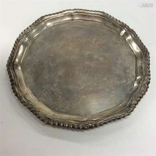 A small pie-crust waiter with gadroon rim. Birming